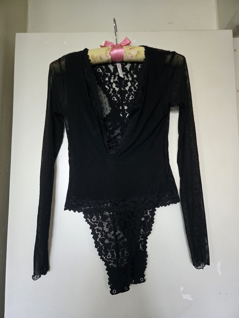 free people long-sleeve mesh and lace bodysuit with a deep V-neckline